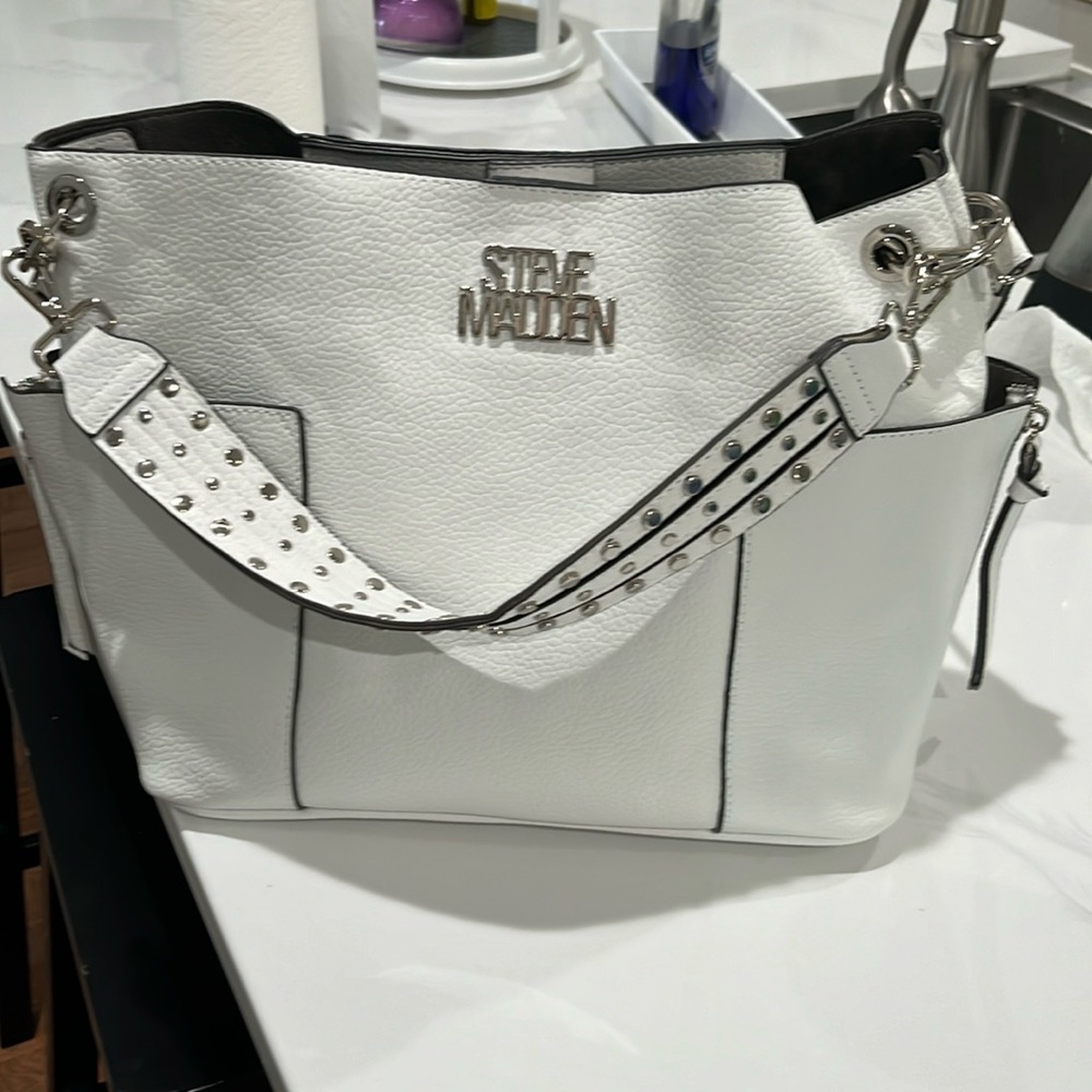 Steve Madden bag with lots of silver hardware-